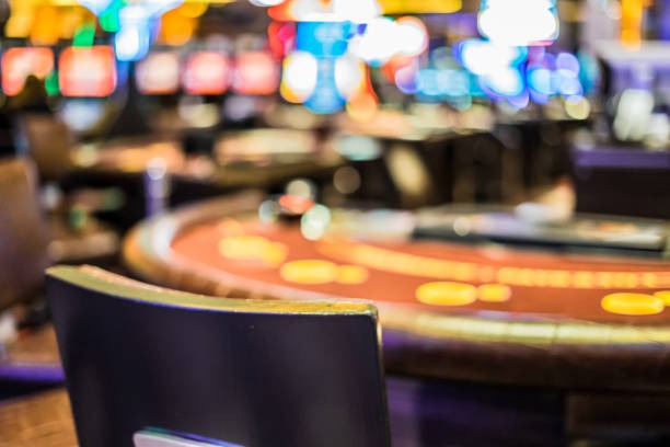 Live baccarat table with multiple camera angles showing dealer and cards